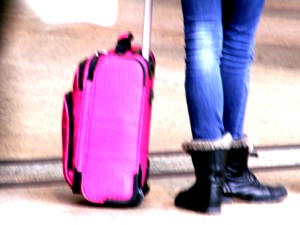 Reisende mit Koffer